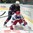 SPISSKA NOVA VES, SLOVAKIA - APRIL 15: USA's Nate Knoepke #5 takes down Russia's Andrei Svechnikov #14 during preliminary round action at the 2017 IIHF Ice Hockey U18 World Championship. (Photo by Steve Kingsman/HHOF-IIHF Images)

